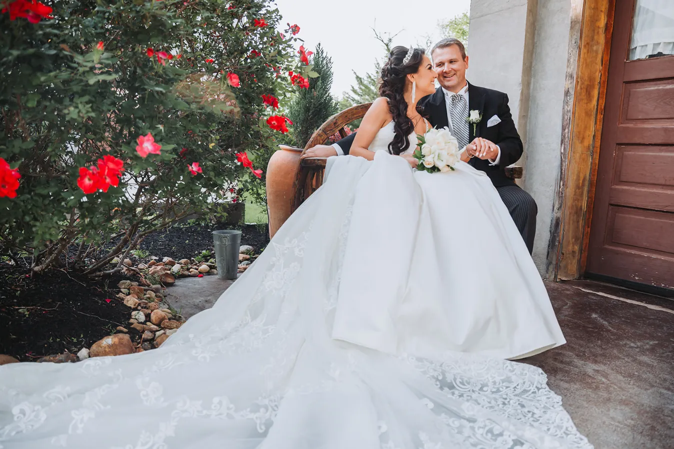 Casandra and Kevins wedding with gorgeous red blooms